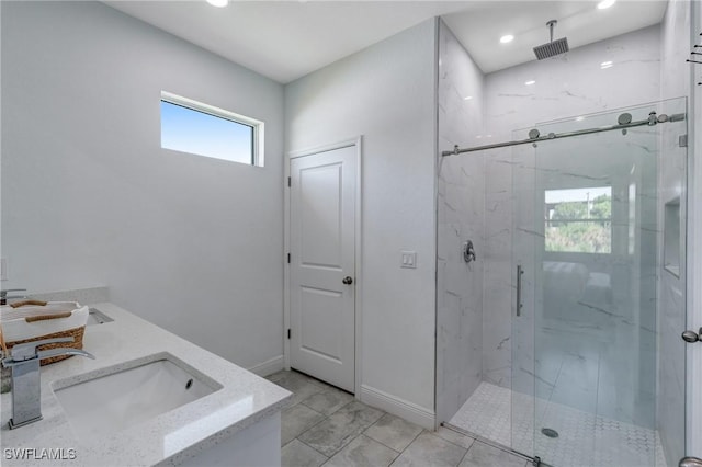 2013 Inglewood Cir, Labelle, FL 33935 - full bathroom featuring a sink, a marble finish shower, recessed lighting, and baseboards