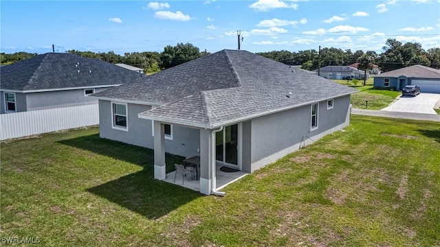 2013 Inglewood Cir, Labelle, FL 33935 - back of house with a shingled roof, stucco siding, and a patio