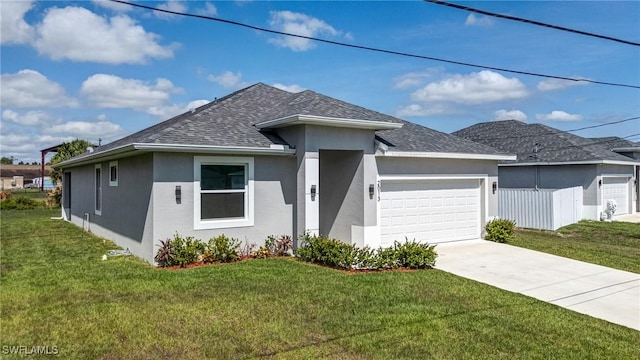 2013 Inglewood Cir, Labelle, FL 33935 - view of front of property featuring stucco siding, a garage, roof with shingles, and a front lawn