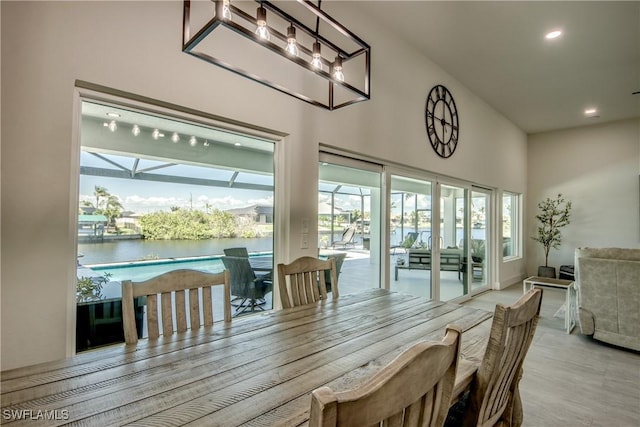 3621 NW 14th St, Cape Coral, FL 33993 - dining area featuring recessed lighting, wood finished floors, and baseboards