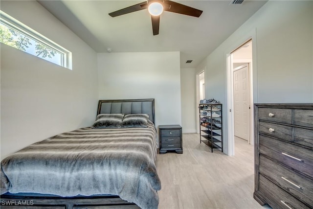 3621 NW 14th St, Cape Coral, FL 33993 - bedroom with wood finished floors and a ceiling fan