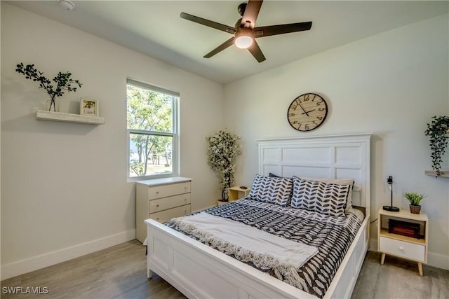3621 NW 14th St, Cape Coral, FL 33993 - bedroom with baseboards, light wood-type flooring, and a ceiling fan