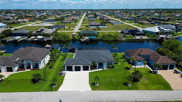 3621 NW 14th St, Cape Coral, FL 33993 - aerial perspective of suburban area featuring a large body of water