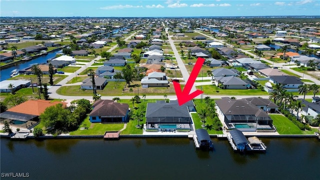 3621 NW 14th St, Cape Coral, FL 33993 - aerial perspective of suburban area with a large body of water