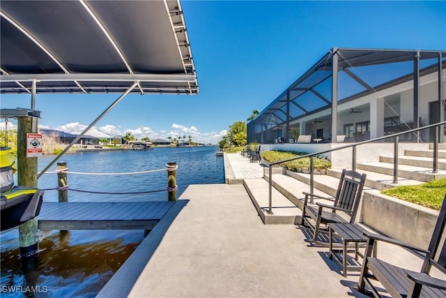 3621 NW 14th St, Cape Coral, FL 33993 - dock area with a water view and a patio area