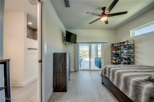 3621 NW 14th St, Cape Coral, FL 33993 - bedroom featuring access to exterior, baseboards, light wood finished floors, and ceiling fan
