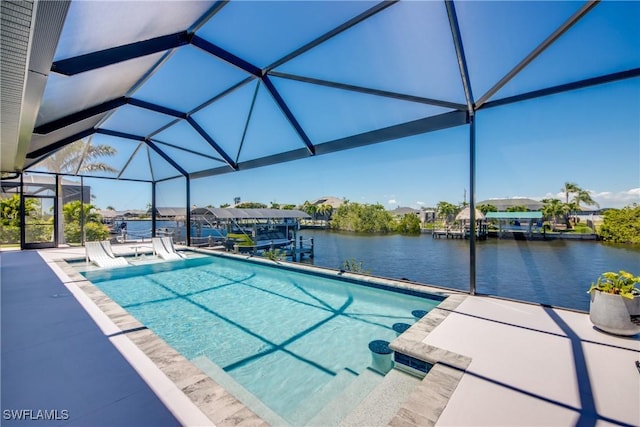 3621 NW 14th St, Cape Coral, FL 33993 - swimming pool featuring a patio, glass enclosure, a water view, a dock, and boat lift