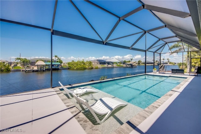 3621 NW 14th St, Cape Coral, FL 33993 - outdoor pool with a water view, a patio, and glass enclosure