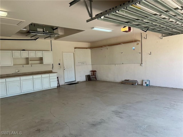 325 SE 21st St, Cape Coral, FL 33990 - garage featuring a garage door opener