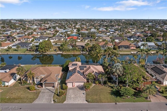 325 SE 21st St, Cape Coral, FL 33990 - aerial view of property's location with a nearby body of water and nearby suburban area