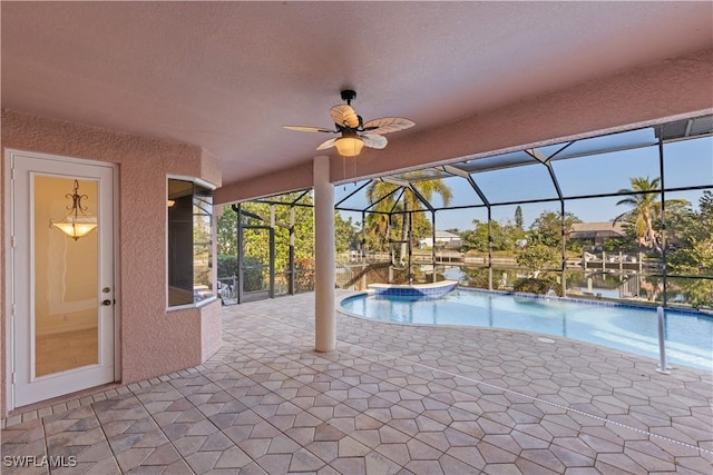 325 SE 21st St, Cape Coral, FL 33990 - swimming pool with a patio area, glass enclosure, and a ceiling fan