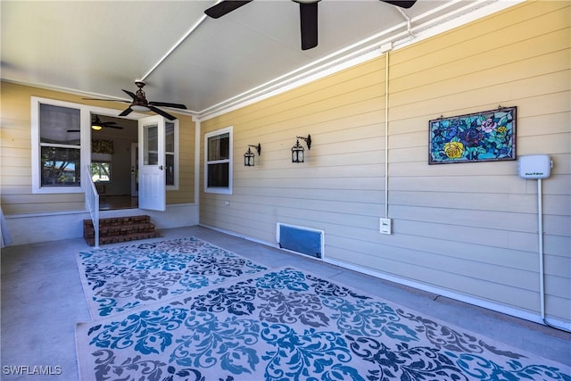 19703 Eagle Trace Ct, North Fort Myers, FL 33903 - view of exterior entry featuring ceiling fan