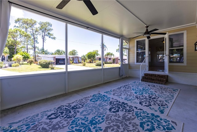 19703 Eagle Trace Ct, North Fort Myers, FL 33903 - sunroom featuring a ceiling fan and entry steps