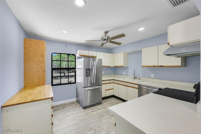 3163 Caledonia Ave, Naples, FL 34112 - kitchen with stainless steel appliances, a sink, light countertops, ceiling fan, and recessed lighting