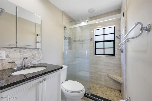 3163 Caledonia Ave, Naples, FL 34112 - bathroom with a stall shower, toilet, tasteful backsplash, and vanity
