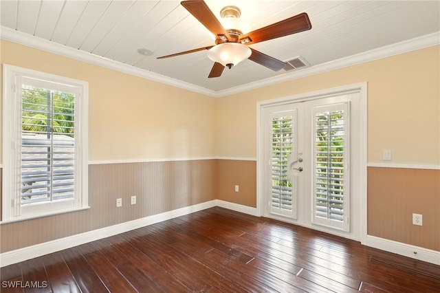 5697 Bay Point Rd, Bokeelia, FL 33922 - unfurnished room with hardwood / wood-style flooring, wainscoting, a ceiling fan, baseboards, and wood walls