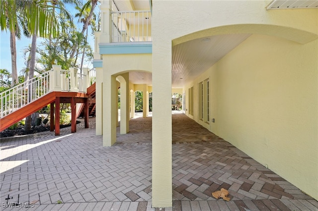 5697 Bay Point Rd, Bokeelia, FL 33922 - view of patio / terrace featuring stairway