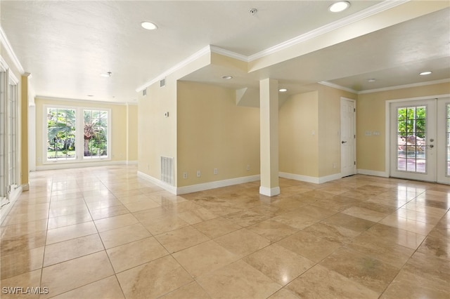 5697 Bay Point Rd, Bokeelia, FL 33922 - empty room featuring ornamental molding, healthy amount of natural light, baseboards, recessed lighting, and a pendent fire sprinkler