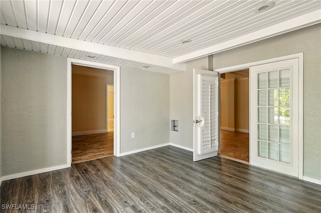 5697 Bay Point Rd, Bokeelia, FL 33922 - unfurnished room featuring dark wood-style floors, wood ceiling, a textured wall, baseboards, and french doors