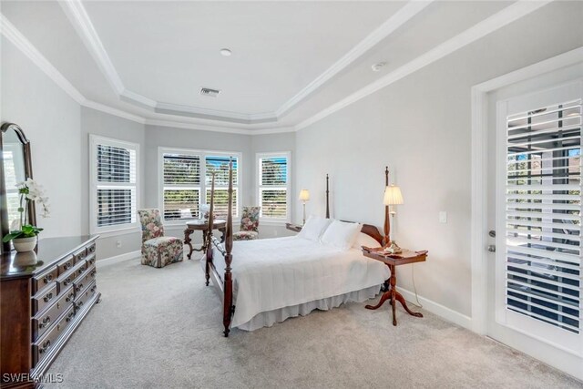 8396 Promoso Ct, Naples, FL 34114 - carpeted bedroom with a tray ceiling, crown molding, and baseboards