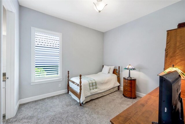 8396 Promoso Ct, Naples, FL 34114 - bedroom with baseboards and carpet flooring