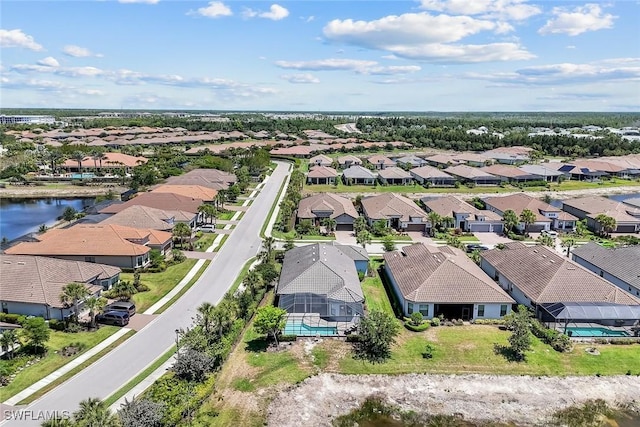 8396 Promoso Ct, Naples, FL 34114 - aerial perspective of suburban area featuring a large body of water