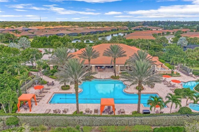 8396 Promoso Ct, Naples, FL 34114 - community pool with a patio