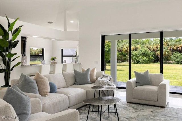 221 10th St SE, Naples, FL 34117 - living area featuring recessed lighting