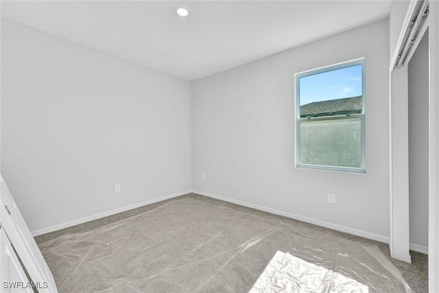 1414 NE 6th Ave, Cape Coral, FL 33909 - unfurnished room featuring carpet, baseboards, and recessed lighting