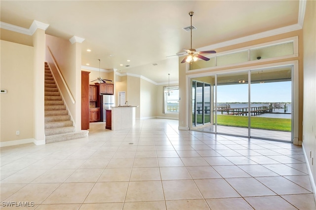6140 River Shore Ct, North Fort Myers, FL 33917 - unfurnished living room featuring a ceiling fan, crown molding, baseboards, light tile patterned flooring, and recessed lighting