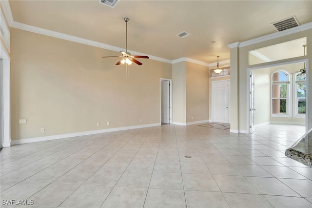 6140 River Shore Ct, North Fort Myers, FL 33917 - unfurnished living room with ornamental molding, light tile patterned floors, a ceiling fan, and baseboards