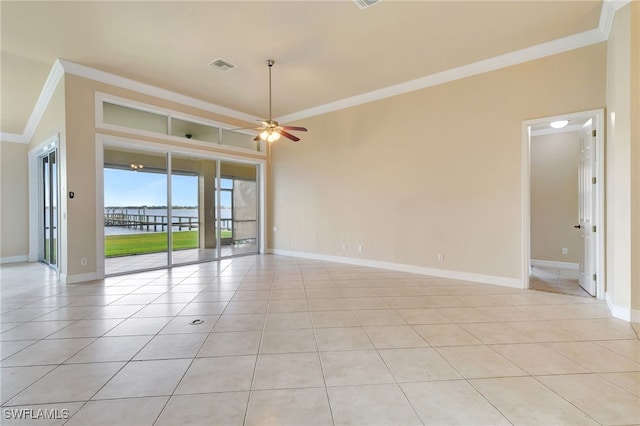 6140 River Shore Ct, North Fort Myers, FL 33917 - empty room featuring ornamental molding, a water view, light tile patterned floors, baseboards, and ceiling fan