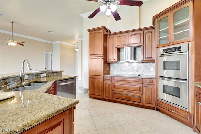 6140 River Shore Ct, North Fort Myers, FL 33917 - kitchen with appliances with stainless steel finishes, a ceiling fan, a sink, ornamental molding, and wall chimney range hood