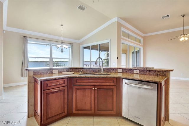 6140 River Shore Ct, North Fort Myers, FL 33917 - kitchen featuring stainless steel dishwasher, a sink, light stone counters, vaulted ceiling, and baseboards