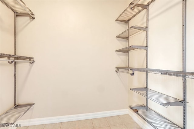 6140 River Shore Ct, North Fort Myers, FL 33917 - spacious closet with light tile patterned flooring