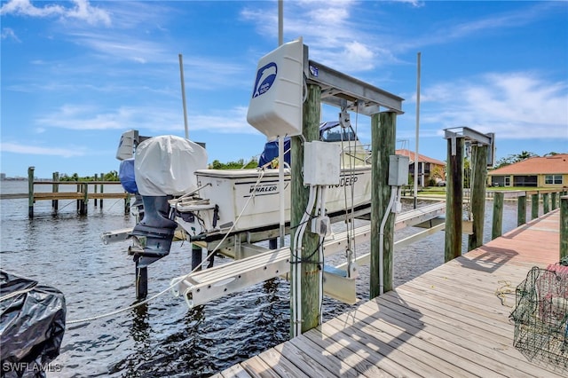 6140 River Shore Ct, North Fort Myers, FL 33917 - dock area with boat lift and a water view