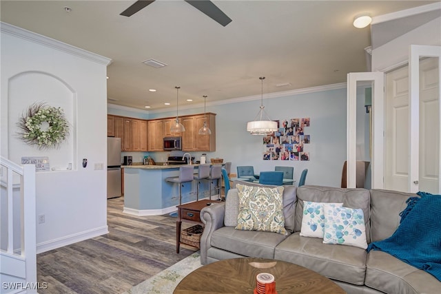 8163 Bibiana Way Unit 301, Fort Myers, FL 33912 - living room featuring light wood-style flooring, ceiling fan, crown molding, recessed lighting, and baseboards