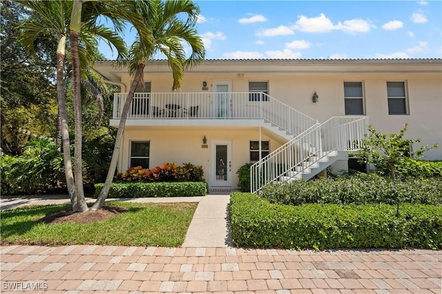 280 4th St S Unit 104, Naples, FL 34102 - view of property with stairway