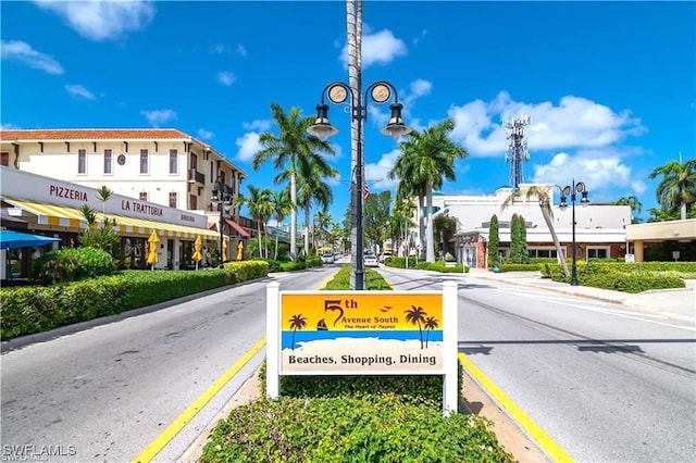 280 4th St S Unit 104, Naples, FL 34102 - view of asphalt road featuring street lighting, curbs, and sidewalks