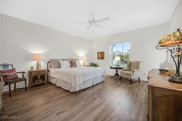 600 Diamond Cir Unit 607, Naples, FL 34110 - bedroom featuring wood finished floors and a ceiling fan