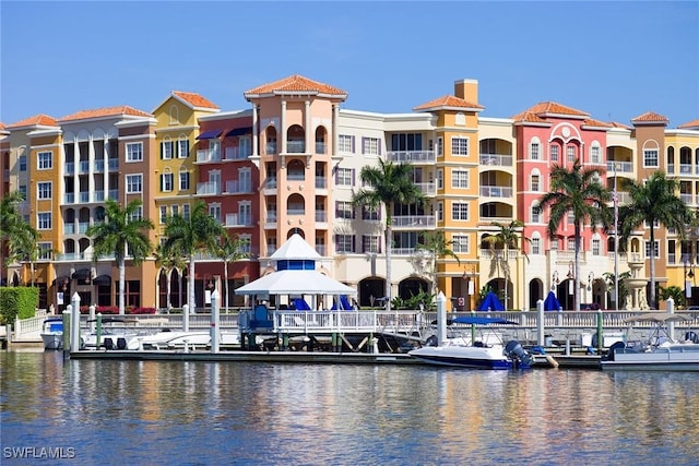 600 Diamond Cir Unit 607, Naples, FL 34110 - view of apartment building / complex featuring a water view