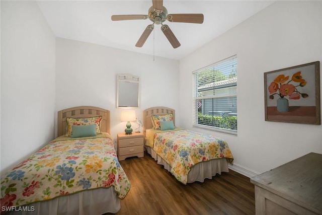 600 Diamond Cir Unit 607, Naples, FL 34110 - bedroom with wood finished floors, baseboards, and ceiling fan
