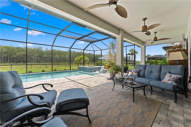 20467 Napa Loop, Estero, FL 33928 - view of patio / terrace featuring a ceiling fan, outdoor lounge area, a lanai, and a pool with connected hot tub