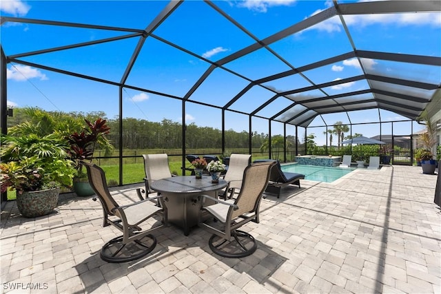 20467 Napa Loop, Estero, FL 33928 - view of patio with a lanai, outdoor dining space, and a pool with connected hot tub