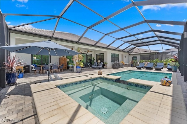 20467 Napa Loop, Estero, FL 33928 - view of pool with ceiling fan, a patio area, a pool with connected hot tub, and glass enclosure
