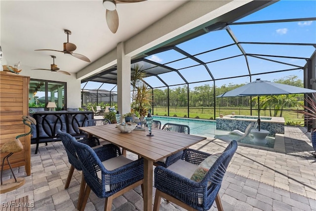 20467 Napa Loop, Estero, FL 33928 - view of patio / terrace featuring a ceiling fan, outdoor dining area, a pool with connected hot tub, and a lanai