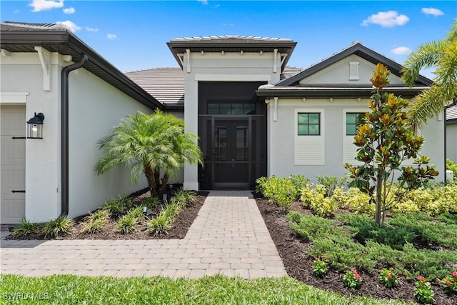 20467 Napa Loop, Estero, FL 33928 - doorway to property with stucco siding, a tiled roof, and french doors