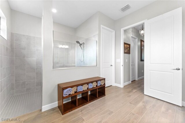 20467 Napa Loop, Estero, FL 33928 - full bathroom featuring a walk in shower, wood finished floors, baseboards, recessed lighting, and a chandelier