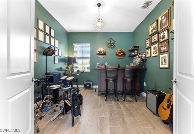 20467 Napa Loop, Estero, FL 33928 - office with a bar, wood finished floors, and baseboards