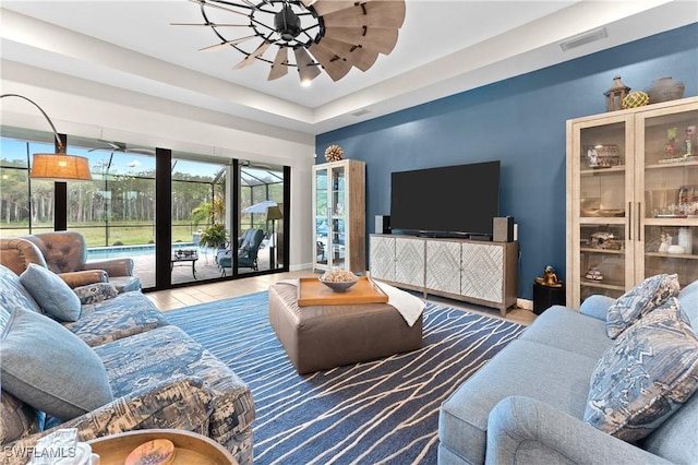 20467 Napa Loop, Estero, FL 33928 - living room with wood finished floors, plenty of natural light, and baseboards